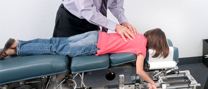 a child getting an adjustment